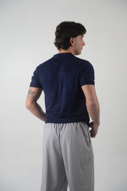 polo a bottoni, maniche corte.